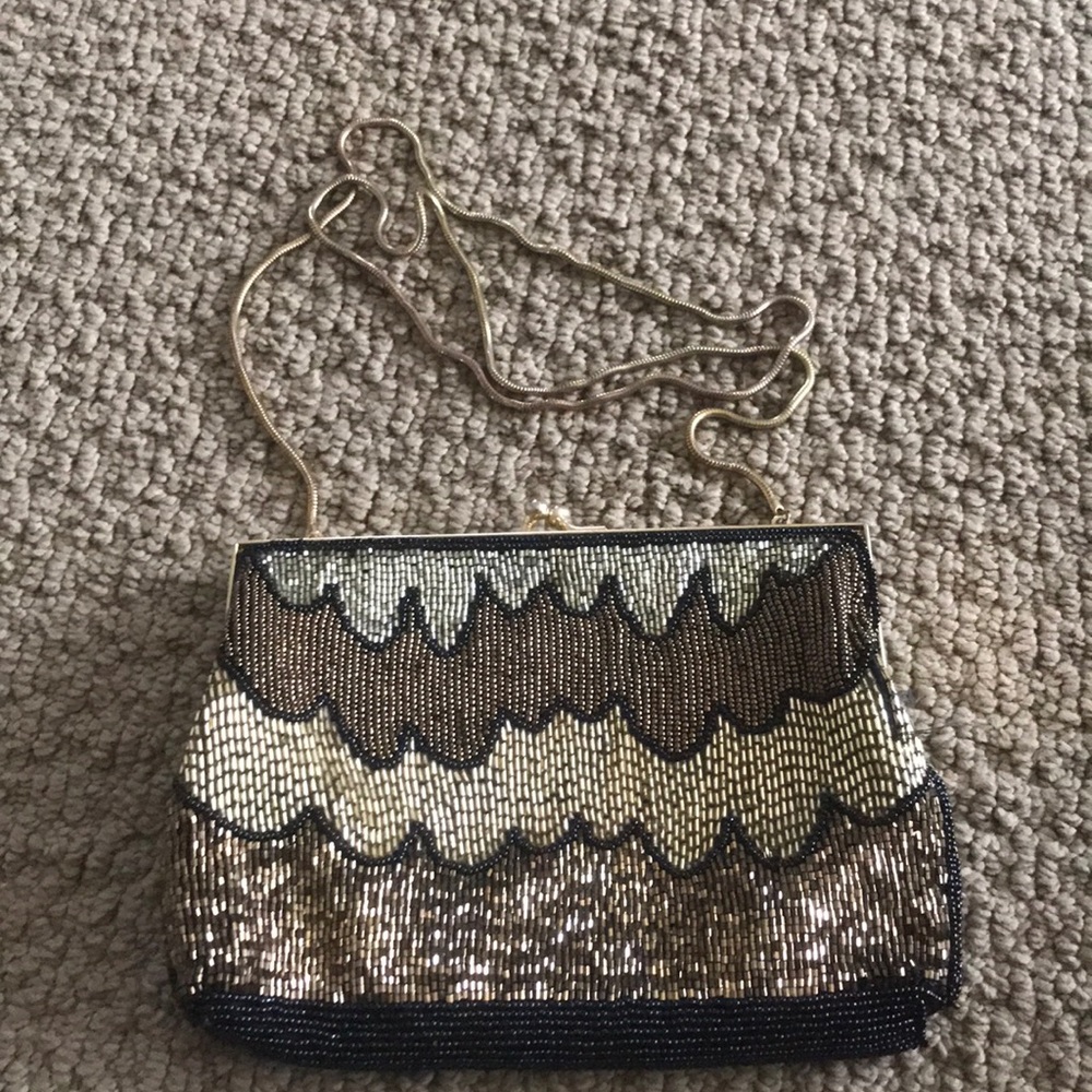 Gold and black evening clutch or shoulder bag.